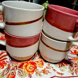 Four mugs. Rise and warm tan. Gorgeous set.